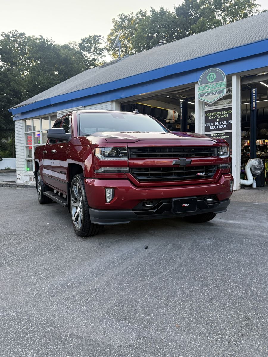 Red Chevy Silverado at Recharge Auto Spa
